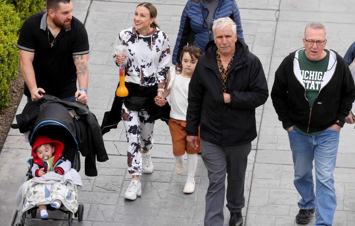 People walk on the Strip at Caesars Palace in Las Vegas Thursday, March 23, 2023. The Las Vegas ...
