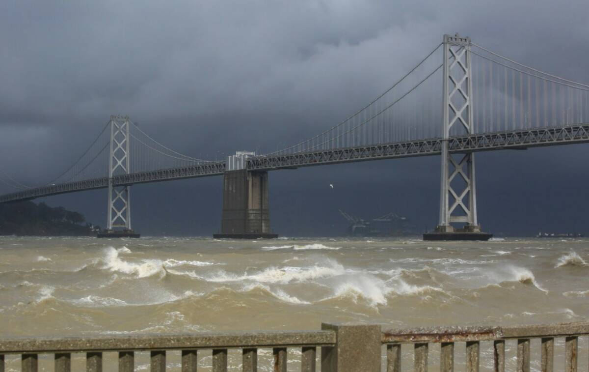High winds create large waves along The Embarcadero near Pier 14 between Mission Street and How ...