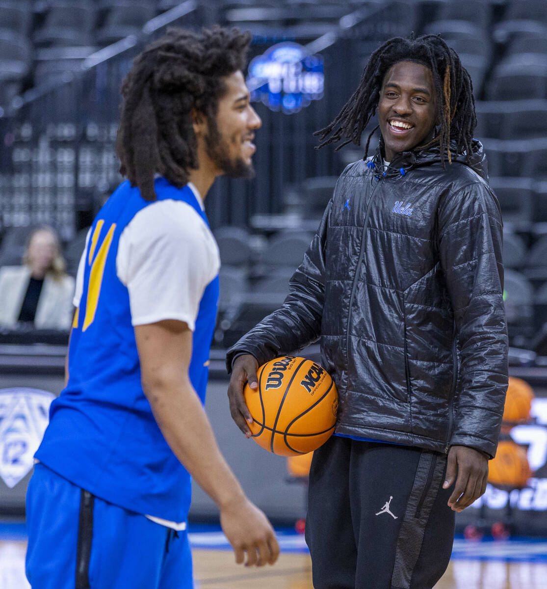 UCLA guards Tyger Campbell, left, and Will McClendon shared laugh as players gather on the cour ...