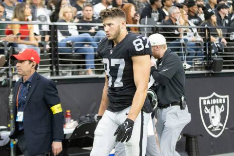 Raiders tight end Foster Moreau (87) leaves the field during the first half of an NFL game agai ...