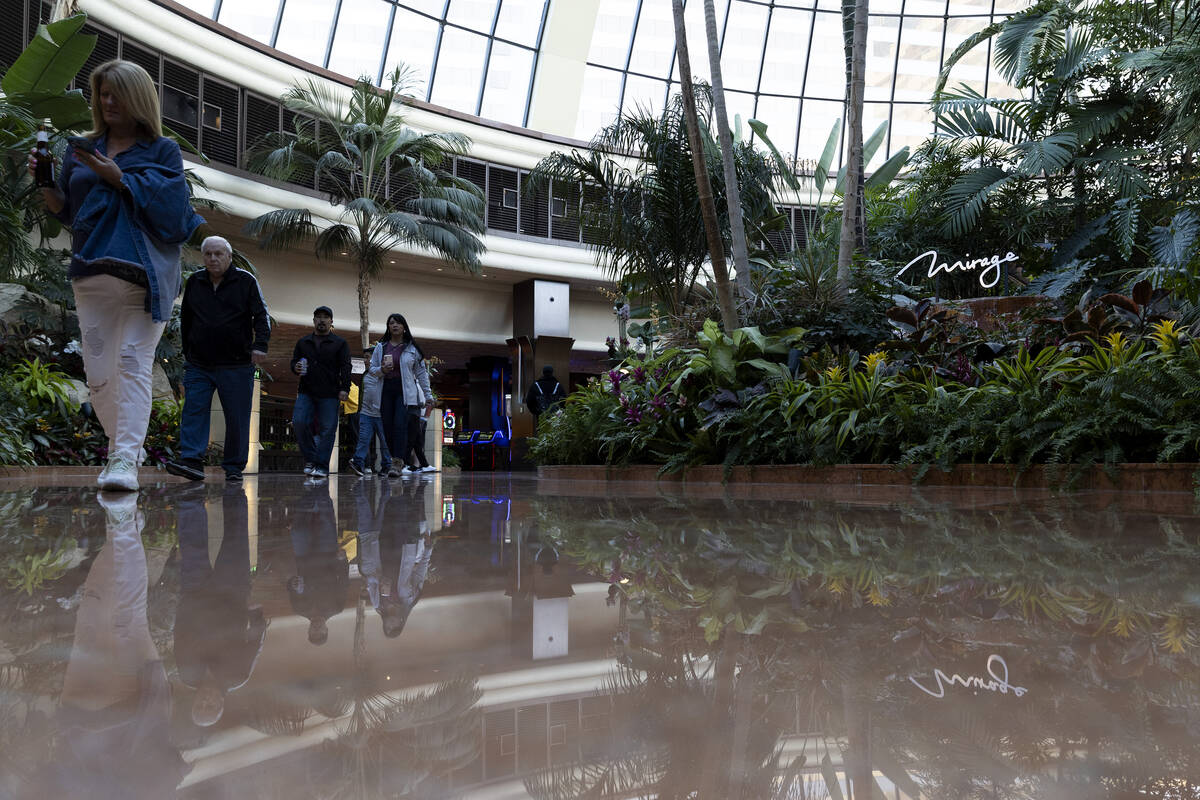 Guests pass through the atrium at The Mirage on Wednesday, March 22, 2023, in Las Vegas. The Mi ...