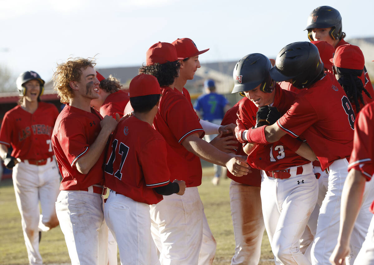 Las Vegas' Gage McGown (13) celebrates their 5-4 victory with his teammates after a baseball ga ...