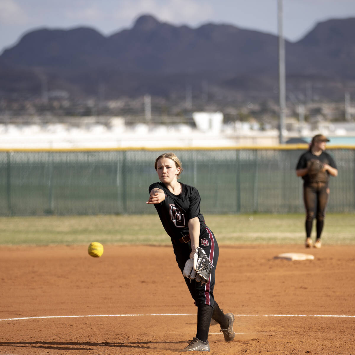 Desert Oasis pitcher Cassidy Infante throws to Silverado during a high school softball game at ...