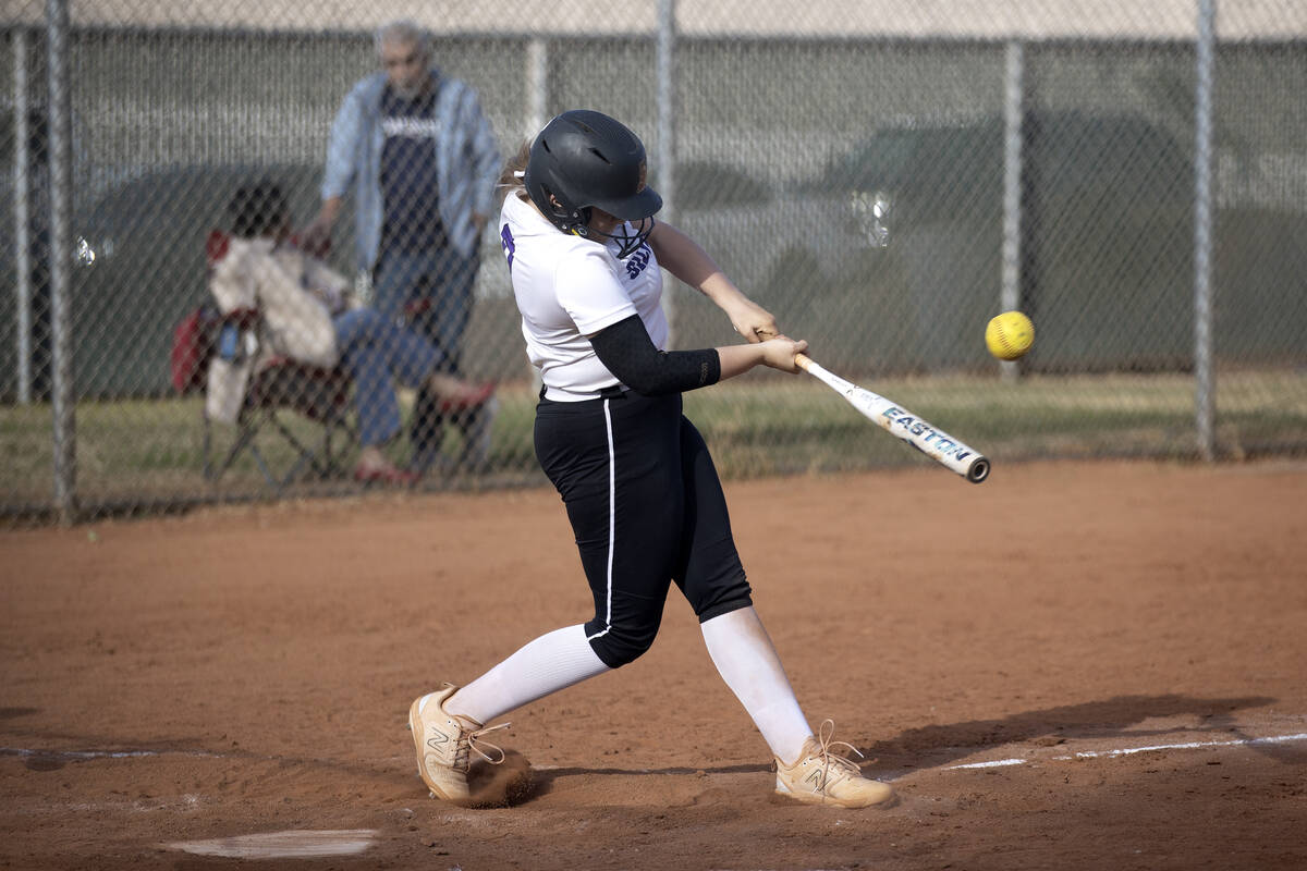 Silverado’s Jordyn Bunce hits during a high school softball game against Desert Oasis at ...
