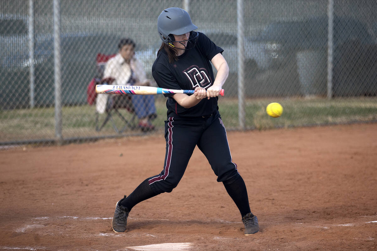 Desert Oasis’ Abigail Stritzel hits during a high school softball game at Silverado High ...