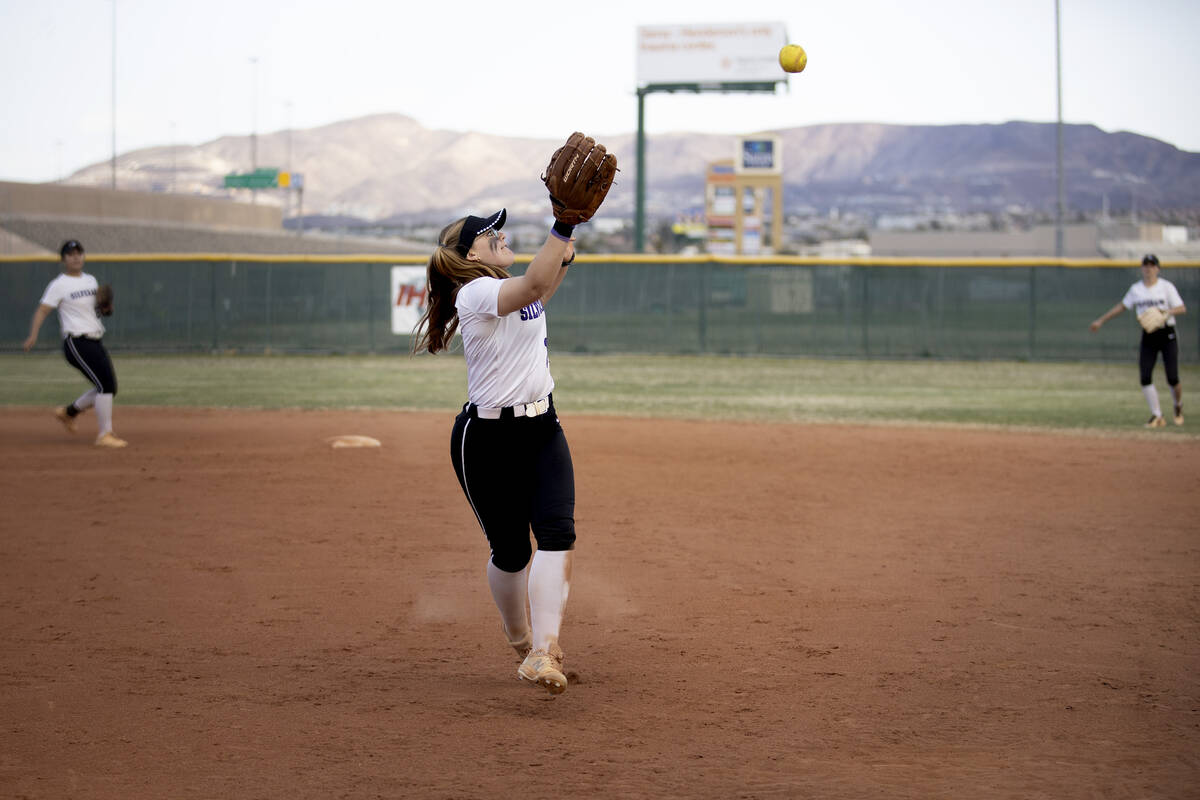 Silverado first baseman Savanna Johnson runs to catch during a high school softball game agains ...