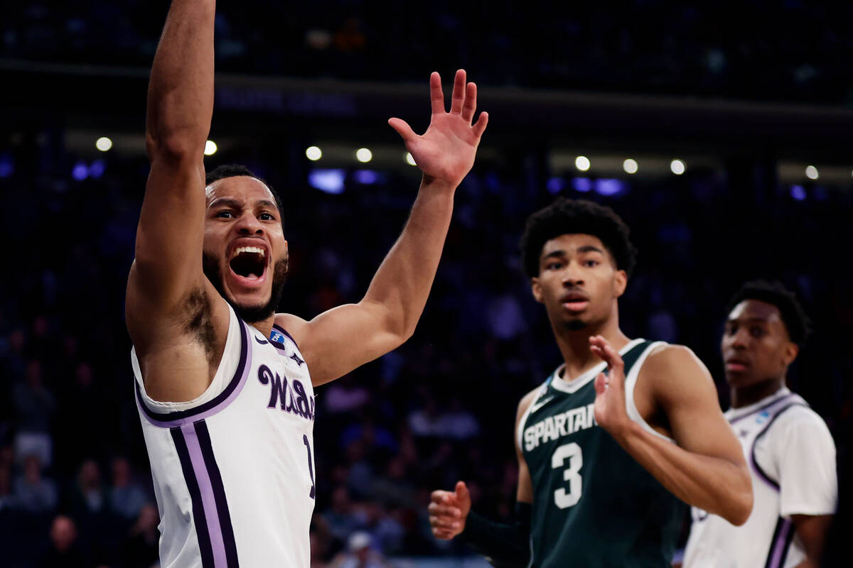 Kansas State guard Markquis Nowell (1) reacts after a play in the first half of a Sweet 16 coll ...