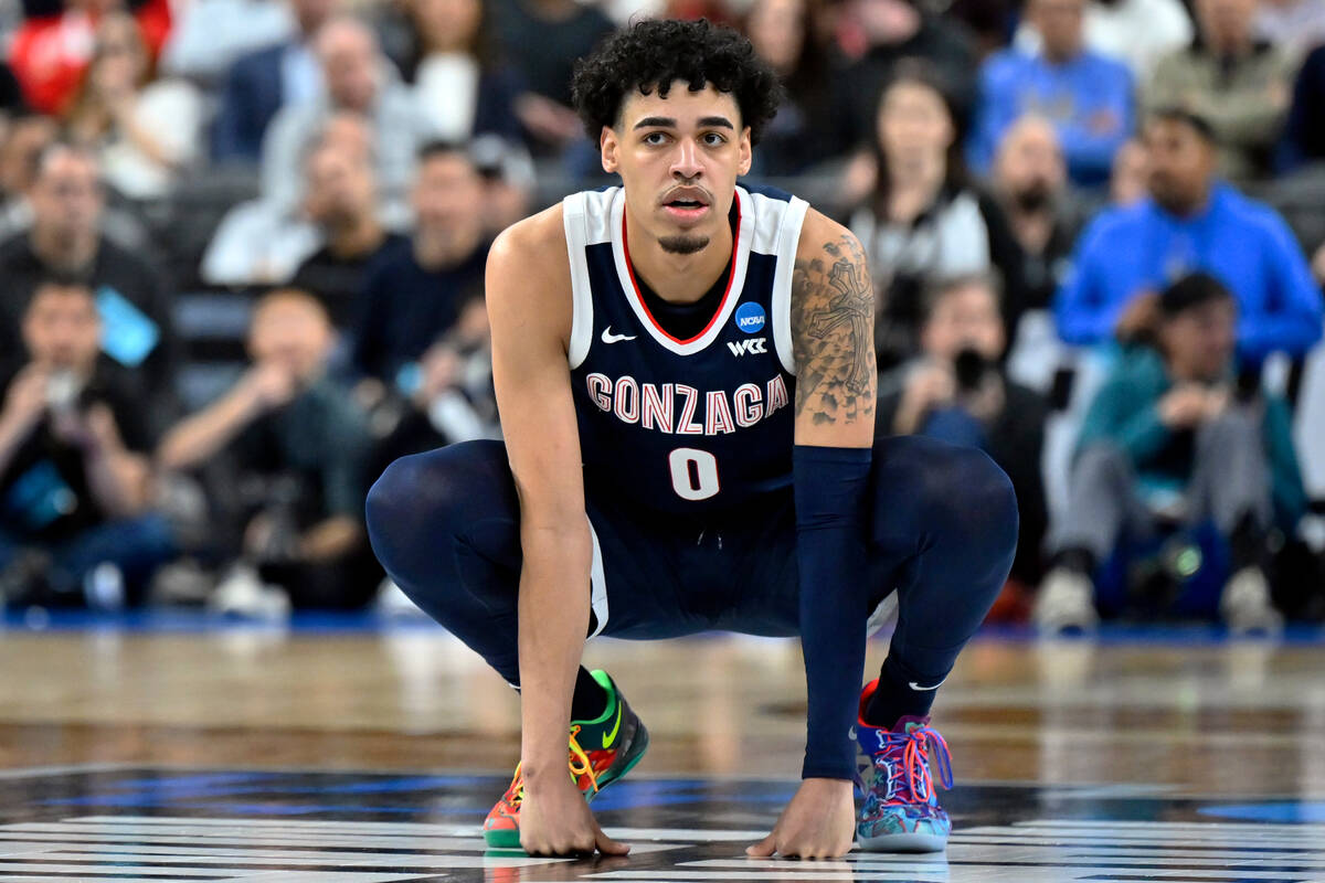 Gonzaga's Julian Strawther (0) reacts in the second half of a Sweet 16 college basketball game ...