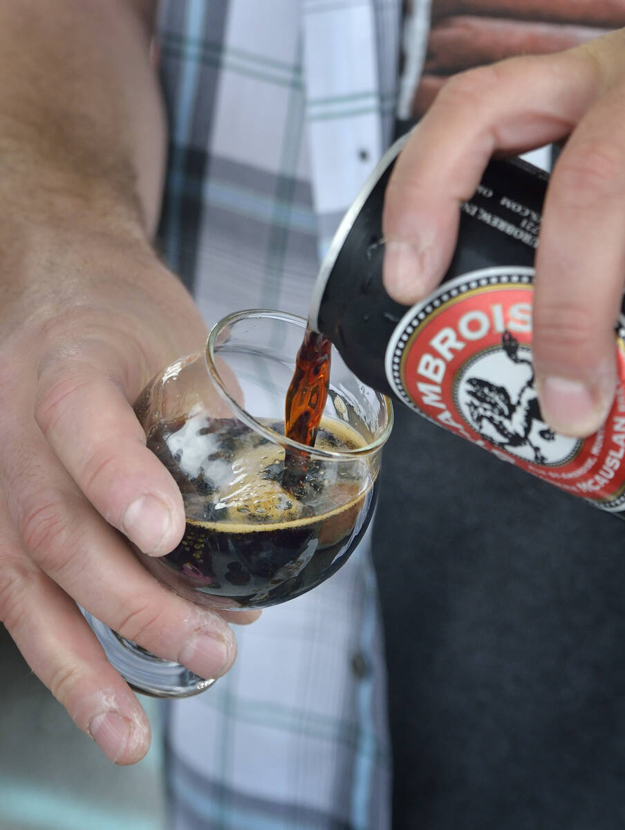 An oatmeal stout is poured at the Eurobrews tent during the Great Vegas Festival of Beer in the ...