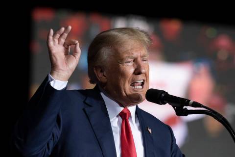 FILE - Former President Donald Trump speaks at the Minden Tahoe Airport in Minden, Nev., on Oct ...