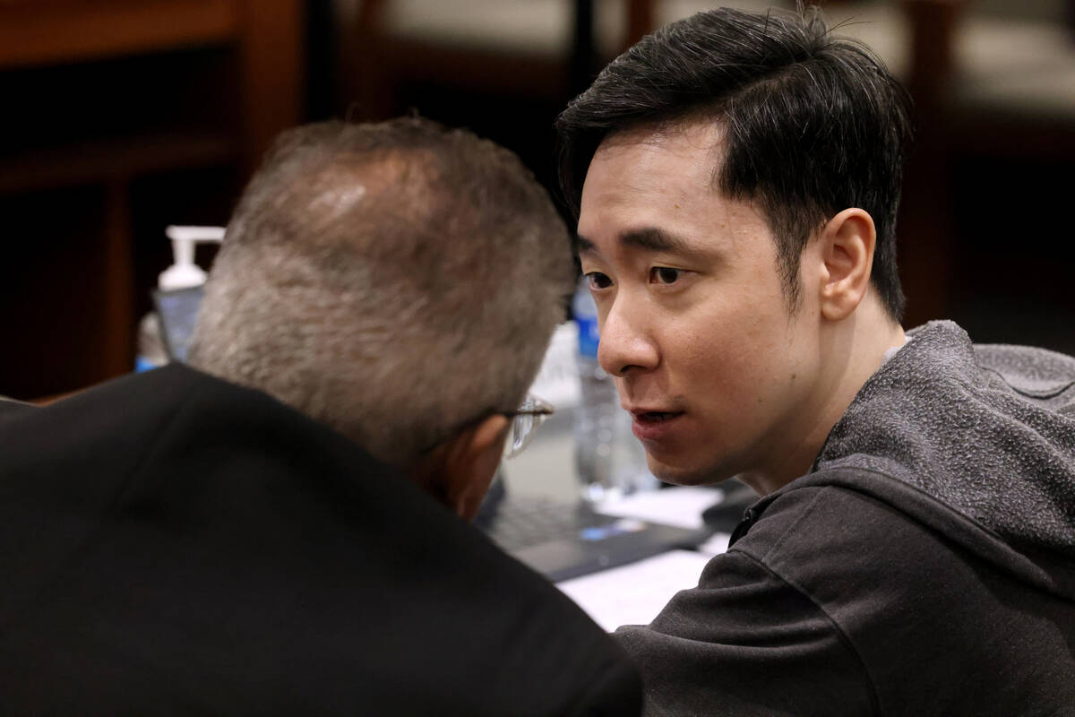 Chan Park talks to his standby attorney Ozzie Fumo while representing himself in court during c ...