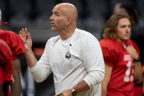 Vegas Knight Hawks head coach Mike Davis talks to the team during practice at the Dollar Loan C ...