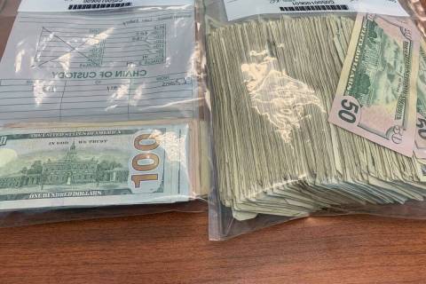Some of the money returned to Dunwoody, Georgia, police after the cash flew out an armored truc ...