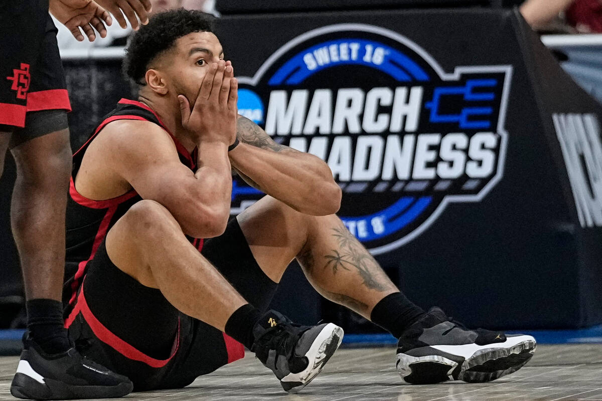 San Diego State guard Matt Bradley (20) reacts after being called for a fopul against Alabama i ...