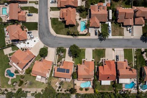 A drone image over a housing tract that has been part of the state water project, where outdoor ...