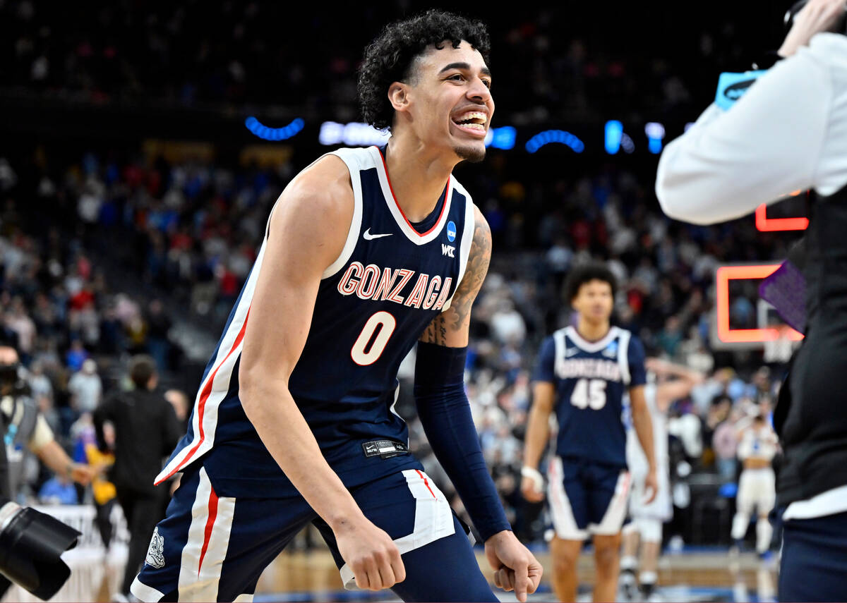 Gonzaga's Julian Strawther (0) celebrates after the team defeated UCLA in Sweet 16 college bask ...