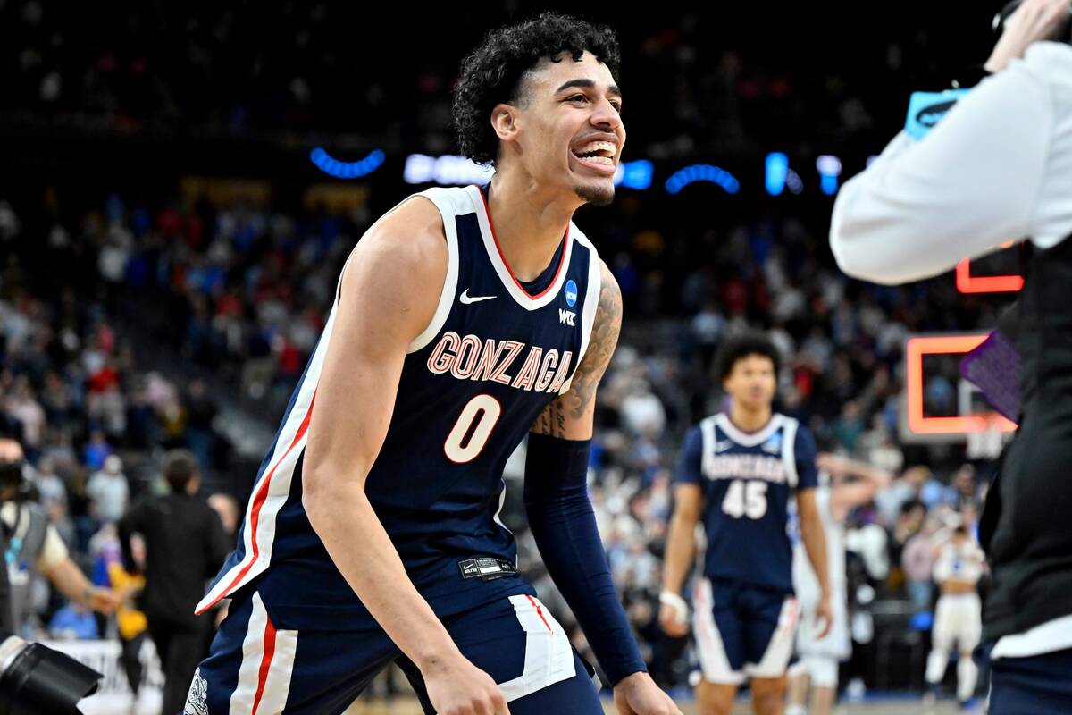 Gonzaga's Julian Strawther (0) celebrates after the team defeated UCLA in Sweet 16 college bask ...