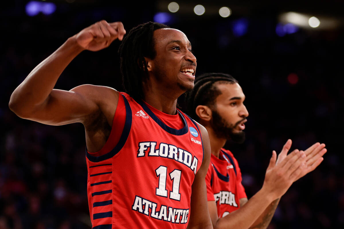 Florida Atlantic's Michael Forrest (11) reacts to a call in the first half of an Elite 8 colleg ...
