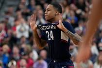 UConn guard Jordan Hawkins (24) celebrates after making a three-point basket in the second half ...