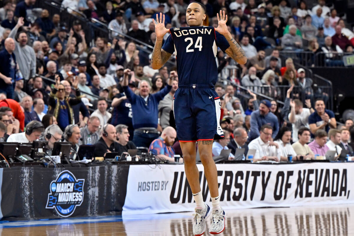UConn guard Jordan Hawkins (24) celebrates after making a three-point basket in the second half ...