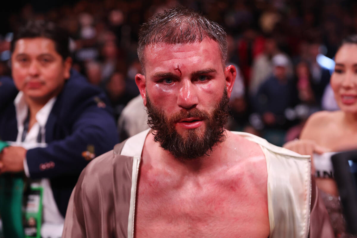 Caleb Plant walks the ring after his unanimous decision loss against David Benavidez in the
 ...