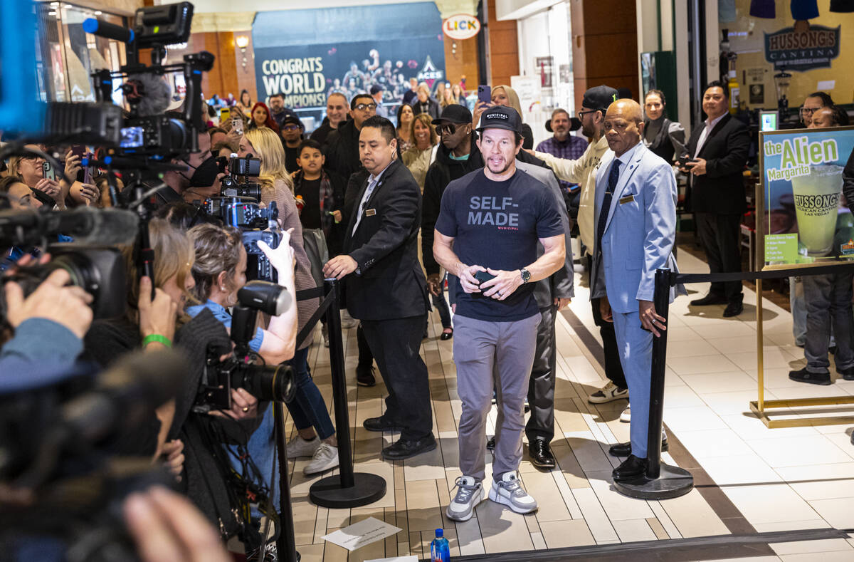 Mark Wahlberg arrives for the opening celebration of a new Wahlburgers at The Shoppes at Mandal ...