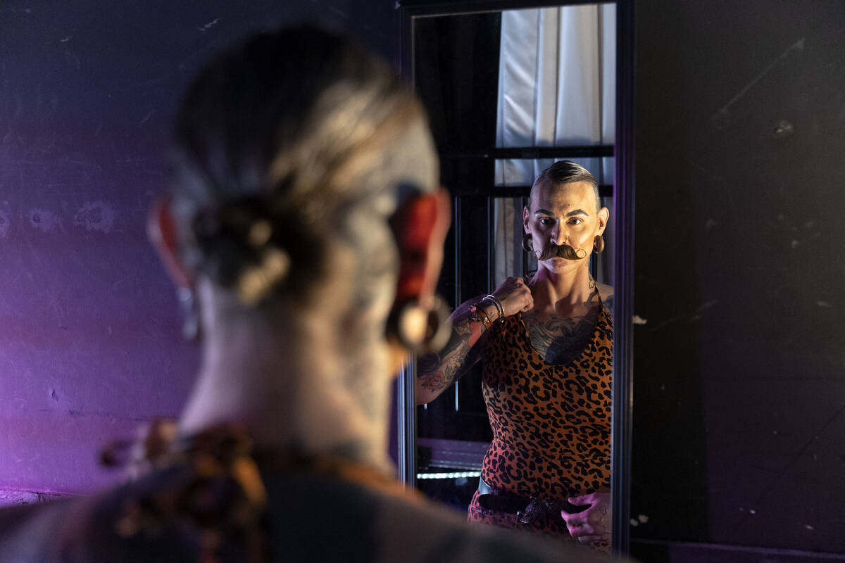 Sarah Dallas, of Elko, Nevada, situates her outfit during the Battle Born Beard and Mustache co ...