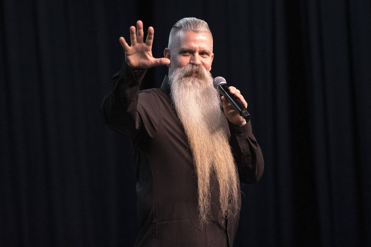 Event founder Patrick Dawson introduces contestants during the Battle Born Beard and Mustache c ...