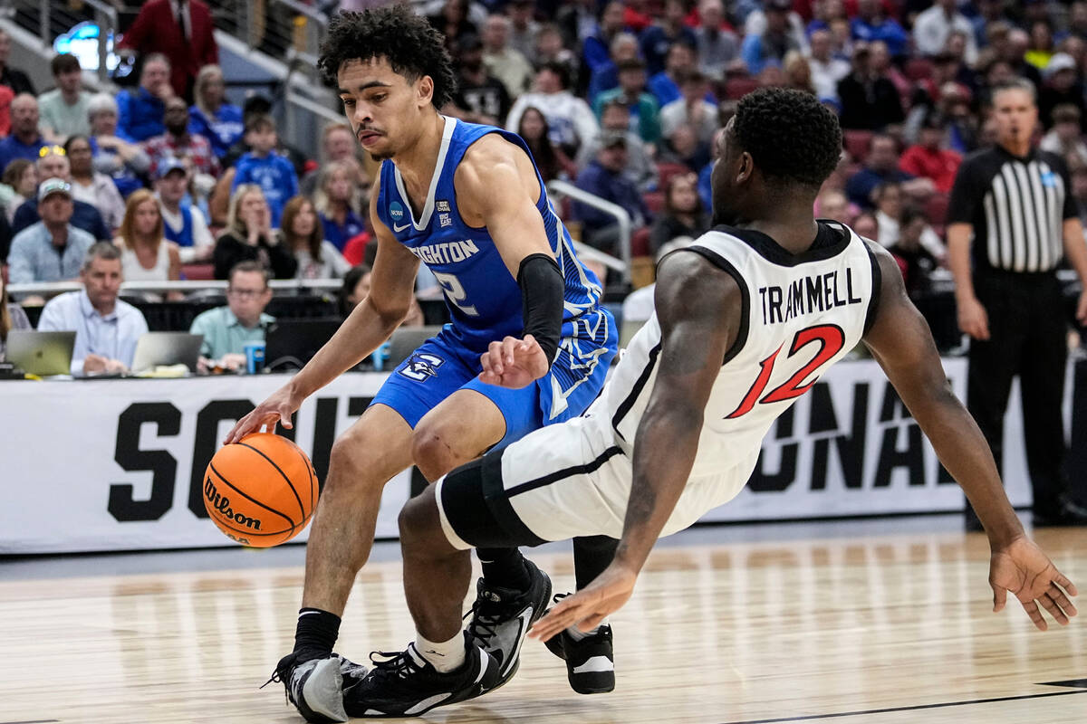 Creighton guard Ryan Nembhard (2) moves the ball against San Diego State guard Darrion Trammell ...