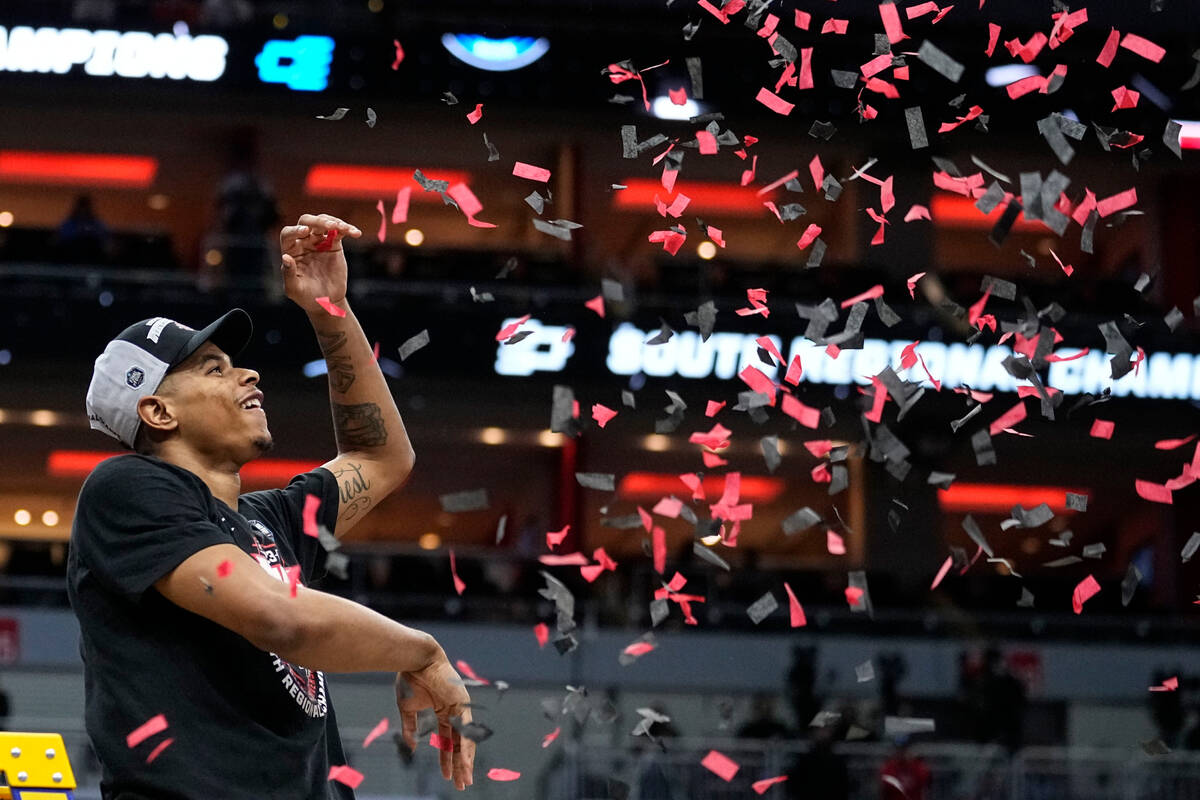 San Diego State guard Matt Bradley throws paper after a Elite 8 college basketball game between ...