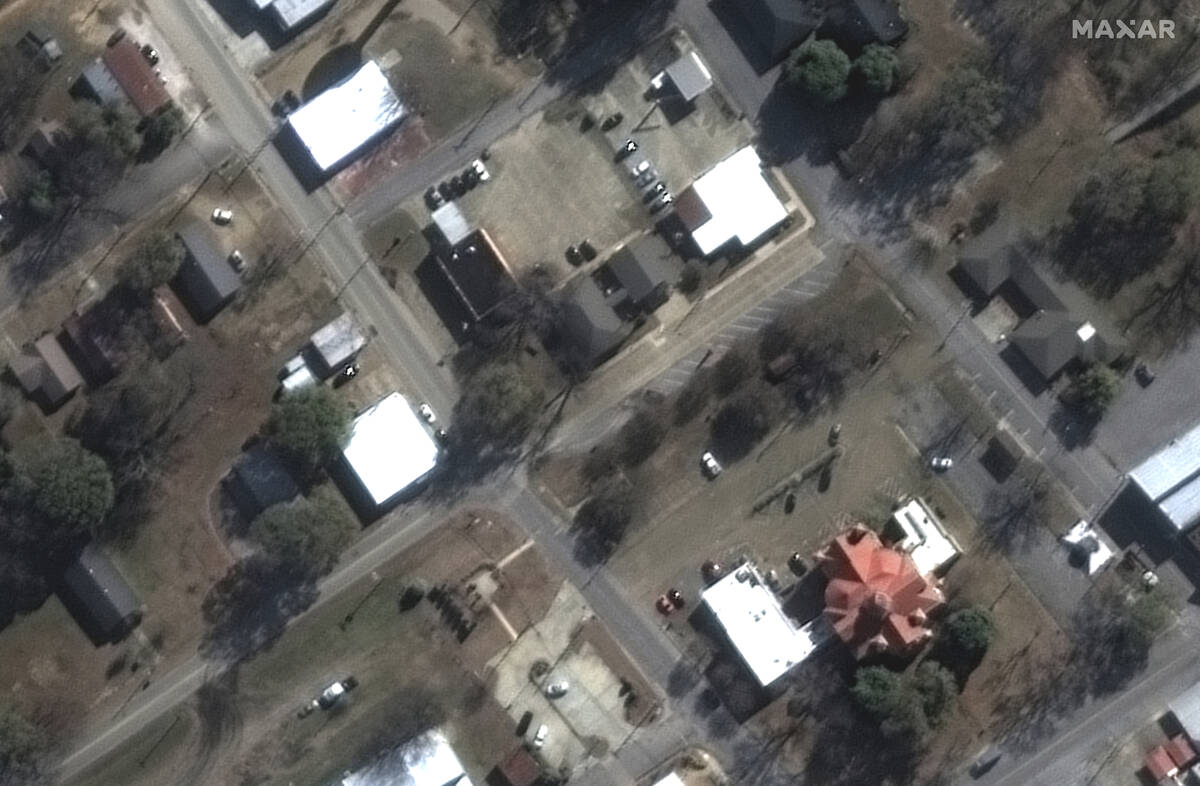 This satellite image provided by Maxar Technologies shows a view of the U.S. Post Office and Co ...