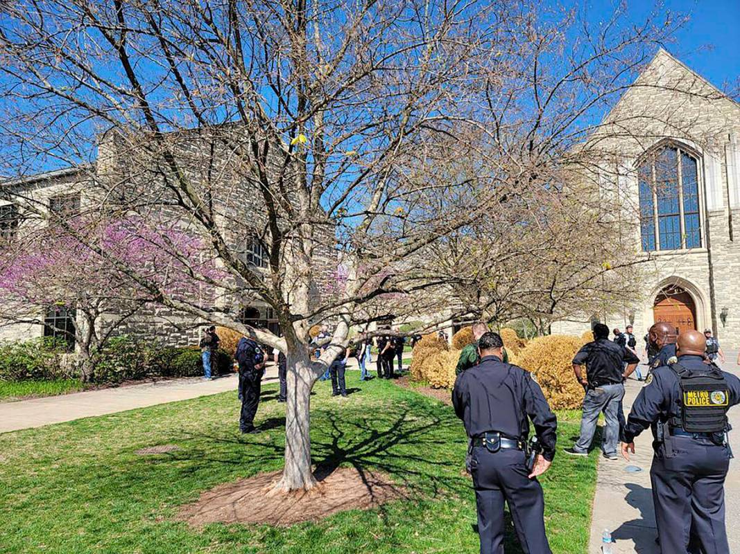 This photo provided by the Metro Nashville Police Department shows officers at an active shoote ...