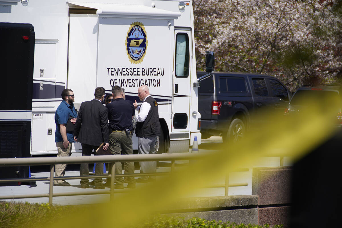 Metro Nashville Police officers gather near The Covenant School, a private Christian school in ...