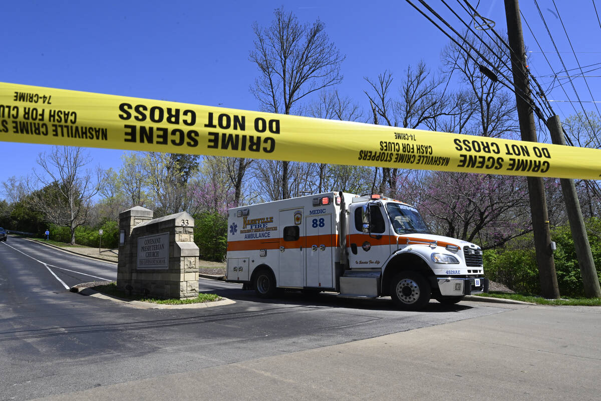 An ambulance leaves The Covenant School in Nashville, Tenn., on Monday, March 27, 2023. Officia ...