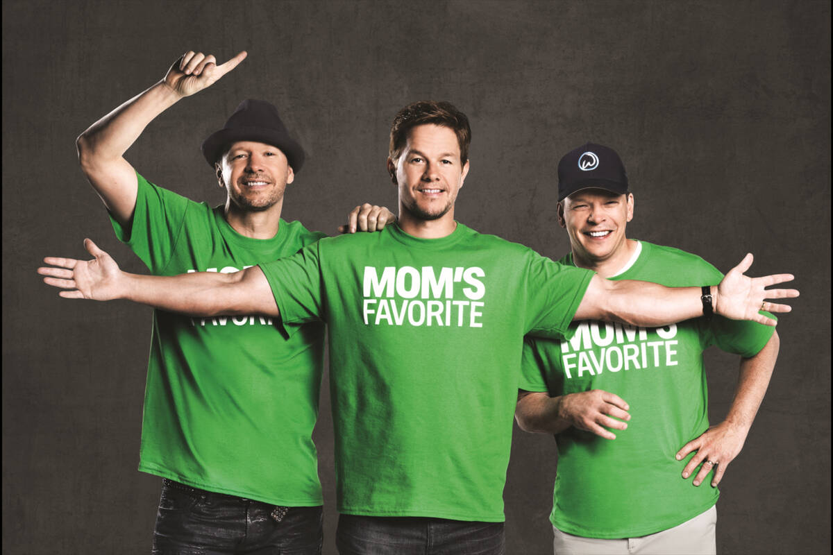 Mark Wahlberg, center, his brother Donnie Wahlberg, left, and brother chef Paul Wahlberg are se ...