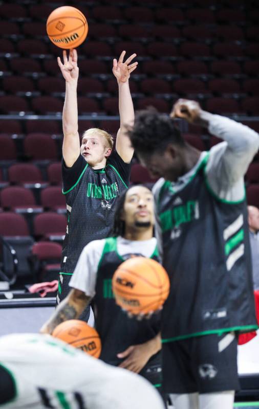 Utah Valley Wolverines player Trey Woodbury takes a shot during practice at the Orleans Arena i ...