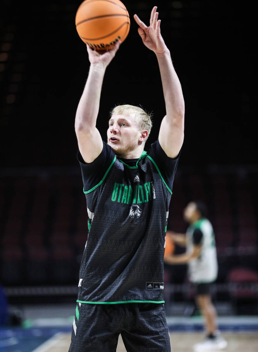 Utah Valley Wolverines player Trey Woodbury takes a shot during practice at the Orleans Arena i ...