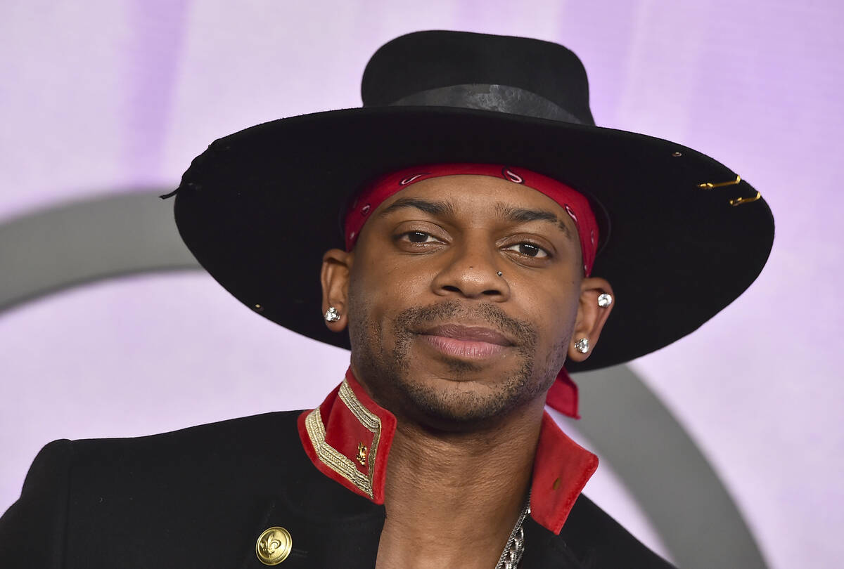 Jimmie Allen arrives at the American Music Awards on Sunday, Nov. 20, 2022, at the Microsoft Th ...