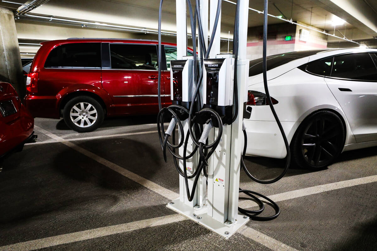 One of the new electric vehicle charging stations at Harry Reid International Airport in Las Ve ...