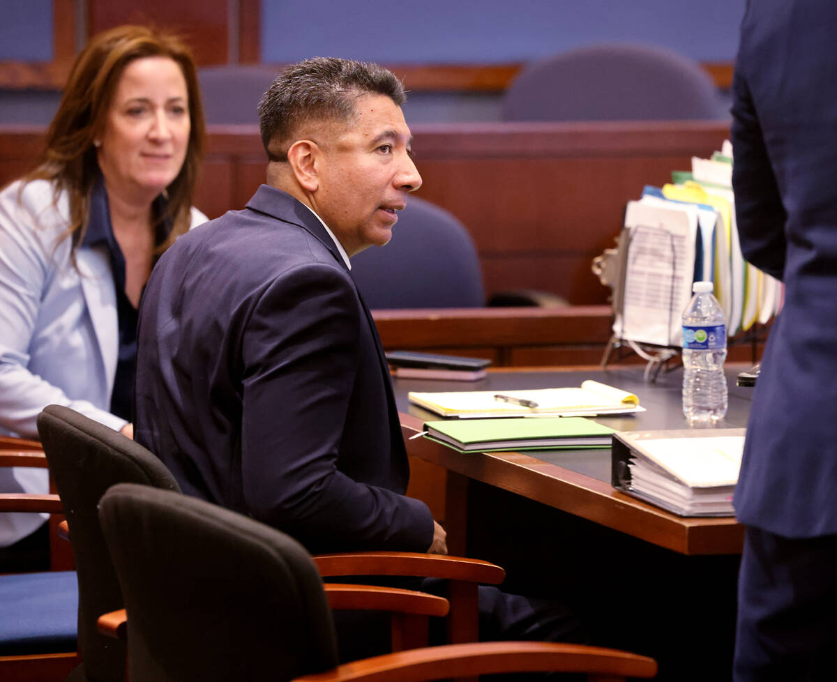 Alpine Motel Apartments former owner Adolfo Orozco, right, waits in court for a preliminary hea ...