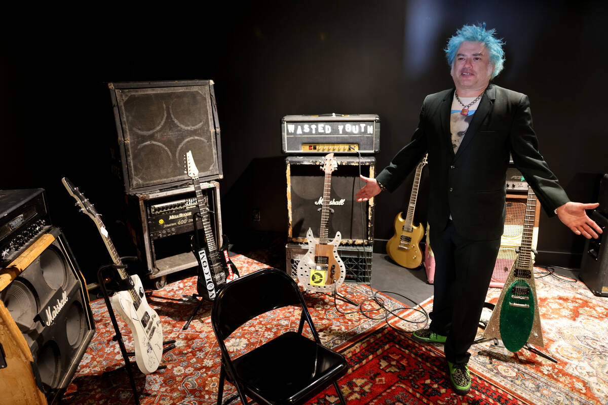“Fat” Mike Burkett, co-founder of The Punk Rock Museum, shows the Jam Room in his ...