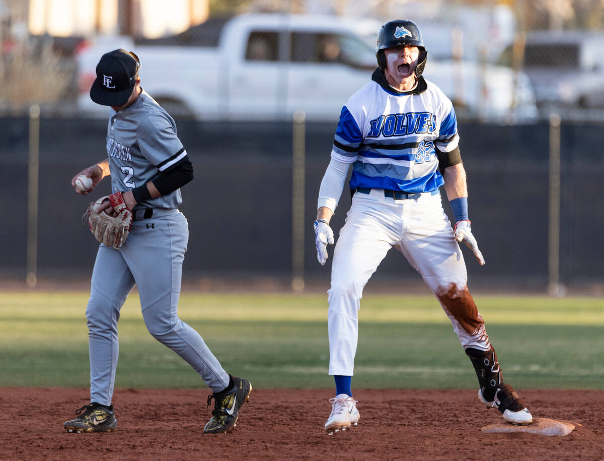 Basic High's Cooper Sheff reacts after hitting a double against Faith Lutheran during their Cla ...