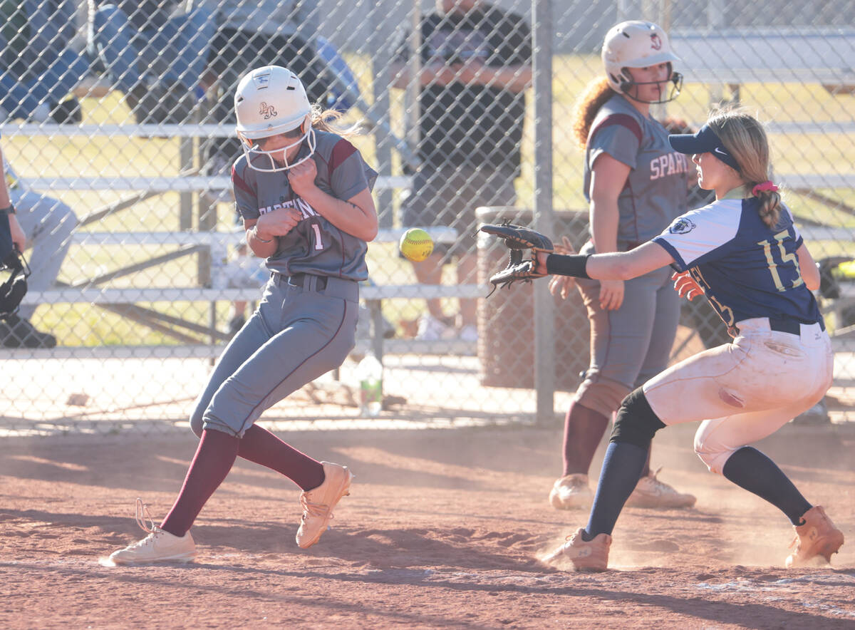 Cimarron-Memorial's Chloe Schoenwald (1) scores a run past Spring Valley's Isabella Lenahan (15 ...