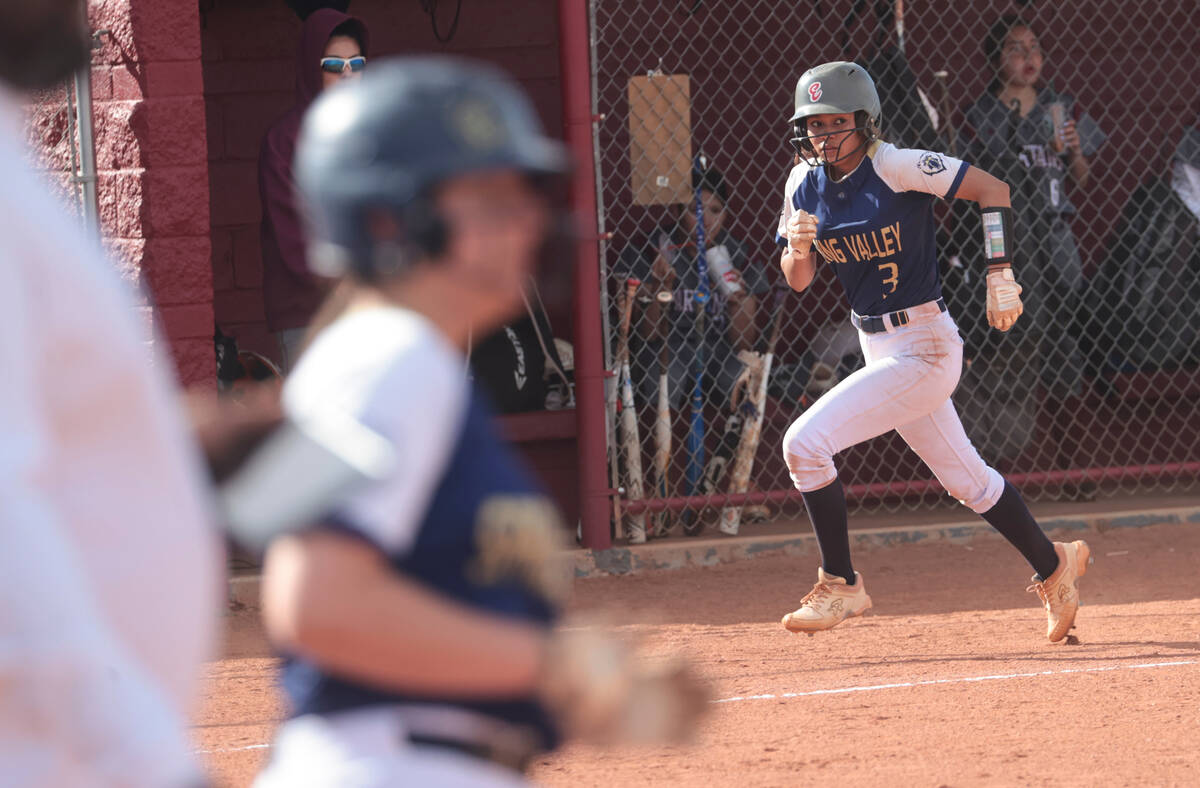 Spring Valley's Aubreyana Sanchez (3) heads to home base to score a run during a softball game ...