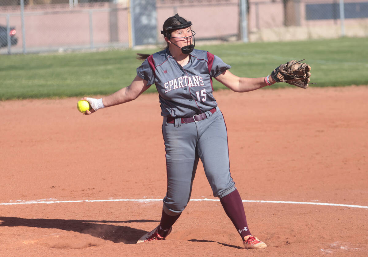 Cimarron-Memorial's Makenna Webber (15) pitches to Spring Valley during a softball game at Cima ...
