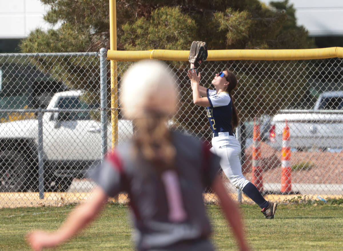 Spring Valley's Jay Kyner (2) looks to catch a fly ball for the out during a softball game at C ...