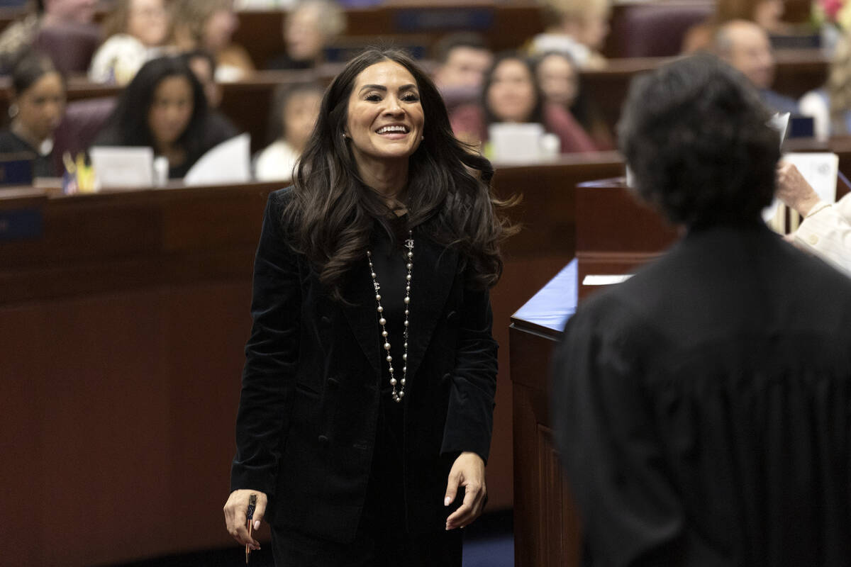 Assemblywoman Sandra Jauregui, D-Las Vegas, greets Chief Justice Lidia S. Stiglich during the f ...