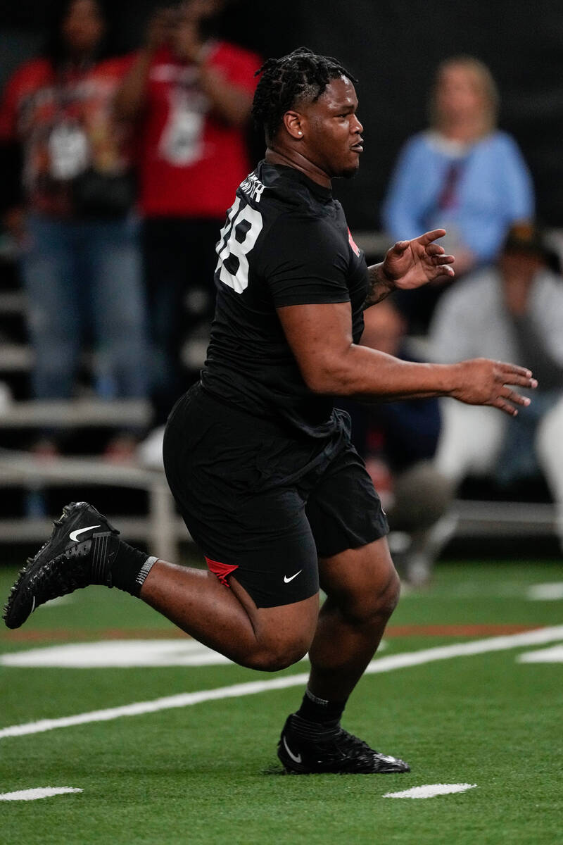Former Georgia defensive lineman Jalen Carter runs football drills during Georgia's Pro Day, We ...