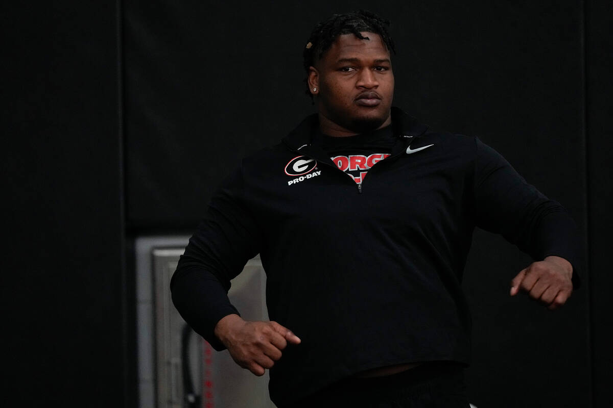 Defensive lineman Jalen Carter stretches during Georgia's Pro Day football, Wednesday, March 15 ...