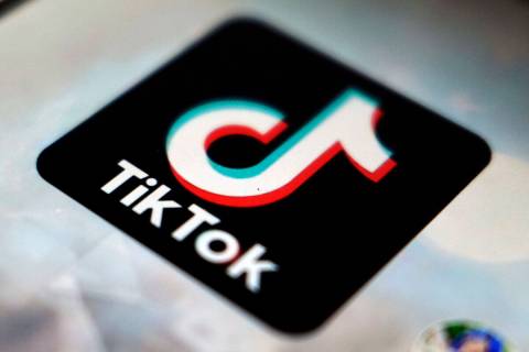 FILE - In this Monday, Sept. 28, 2020 filer, a logo of a smartphone app TikTok is seen on a use ...